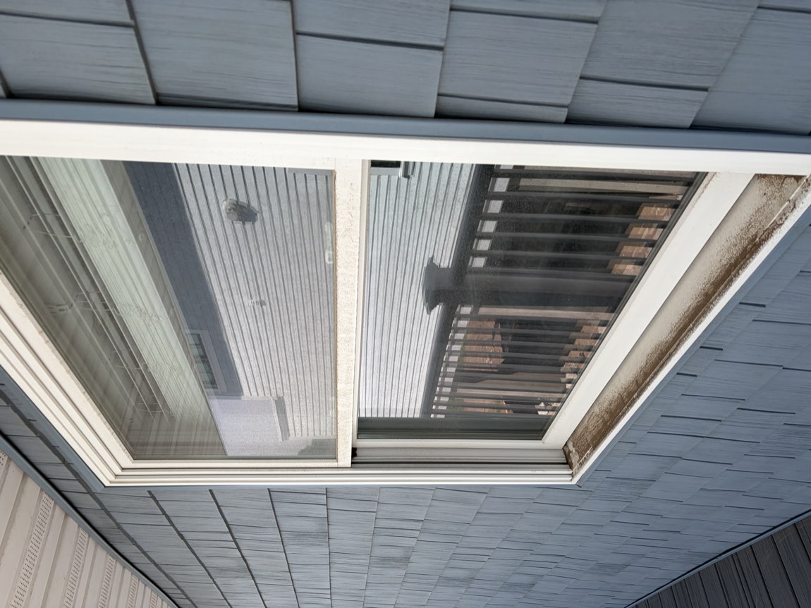 Windows before cleaning — hazy and spotted glass