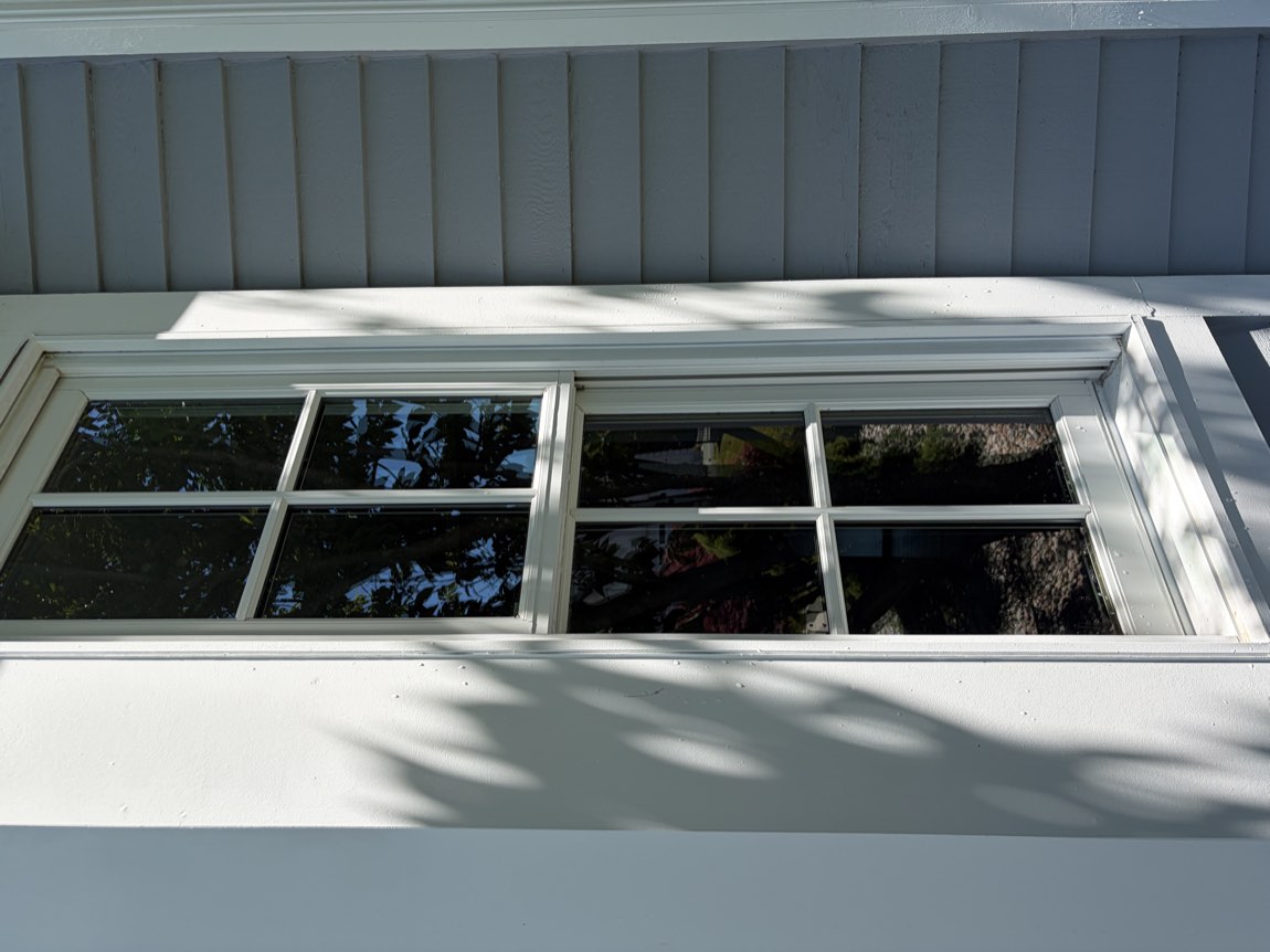 Spotless colonial window with a clean white frame after a G2 Glass Bros clean