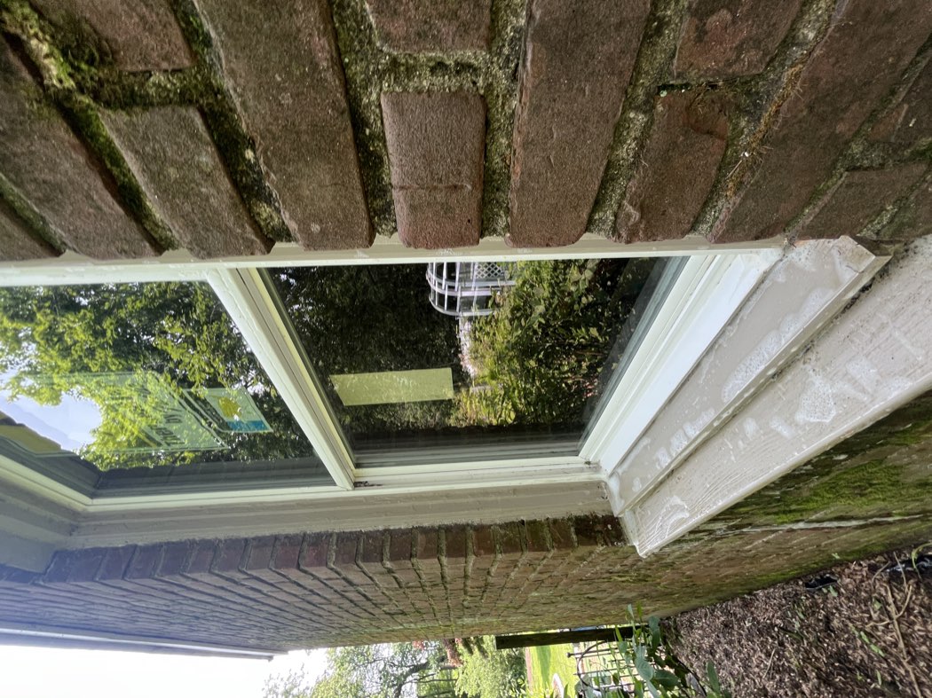 Clean window set in a brick wall