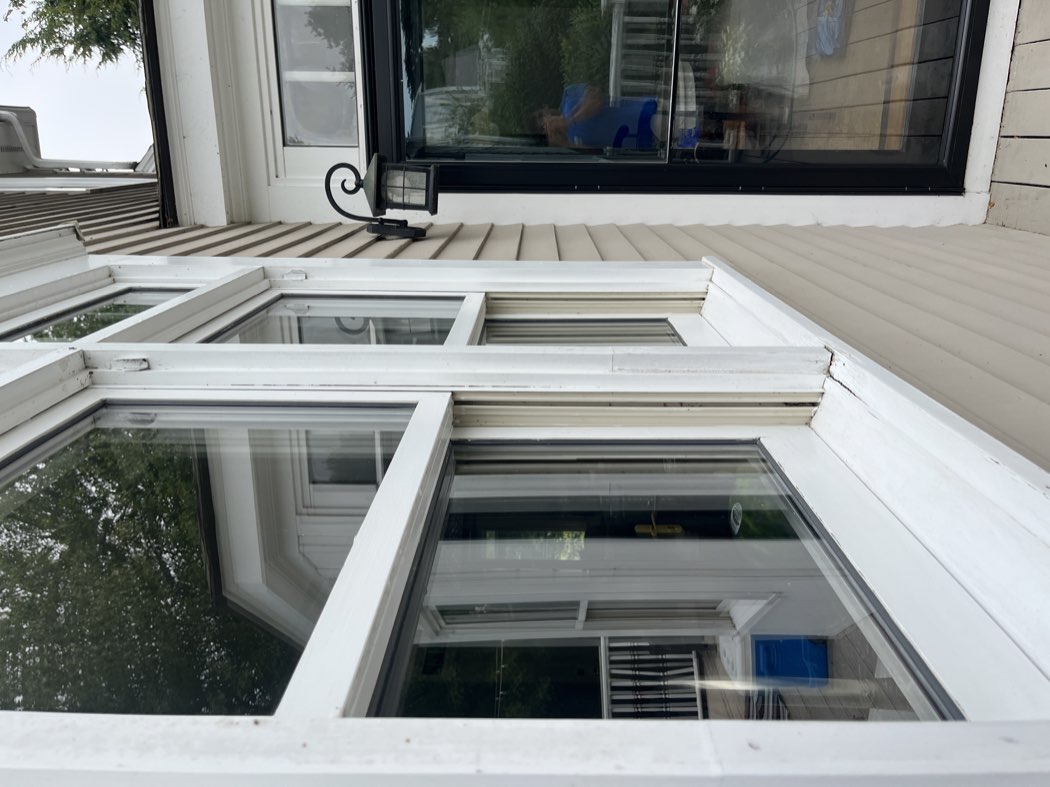 G2 Glass Bros cleaning deck-level windows