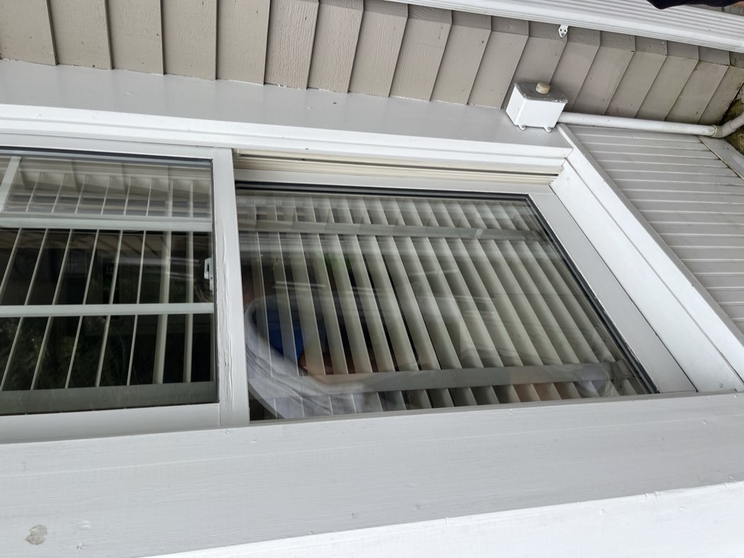 Streak-free window over a covered porch